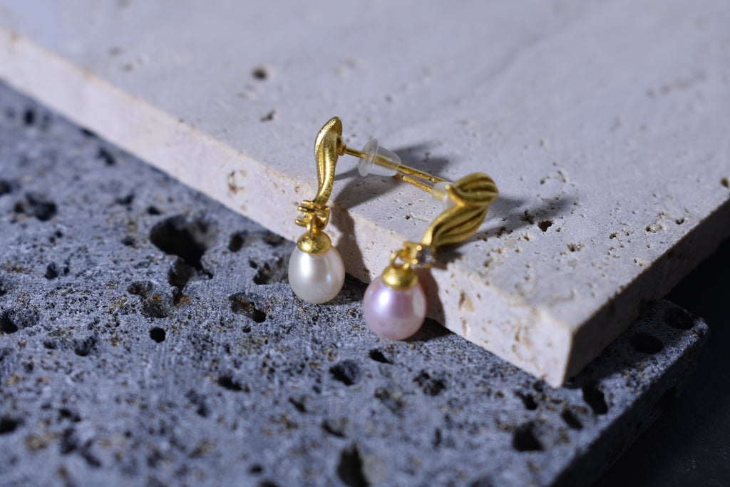 “Elegant Dangling Pearl Stud Earrings”